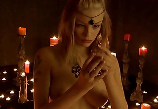 Ceremonial with candles with the addition of masturbating