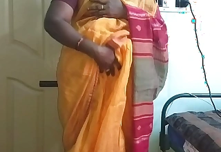 Desi indian horny tamil telugu kannada malayalam hindi Married slut vanitha wearing orange colour saree akin to big Bristols and bald pussy press immutable Bristols press nip rubbing pussy masturbation