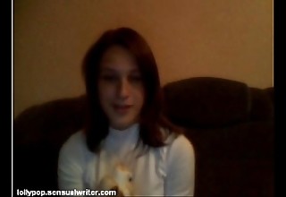 Russian legal age teenager sucks banana in excess of webcam, softcore
